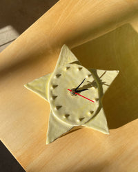 Star Wall Clock in Yellow