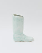 Light blue boot on a white background