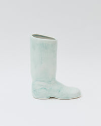 Light blue boot on a white background