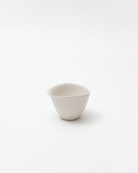 White ceramic cup on a white background