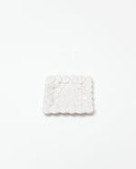White textured square on a white background