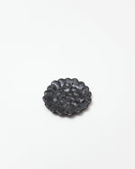 Decorative black plate on a white background