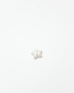 White star-shaped object on a white background