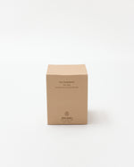 Brown cardboard box labeled 'Tea Ceremony' on a white background