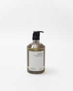 Hand soap bottle with pump on a white background