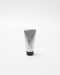 Silver tube of hand cream on a white background