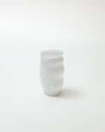 White cup on a white background