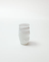 White cup on a white background