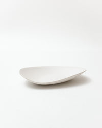 White ceramic plate on a light gray background
