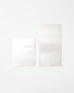 Two plates showing the display shelf disassembled.