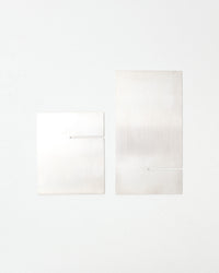 Two plates showing the display shelf disassembled.