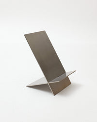 Modern metal shelf on a white background