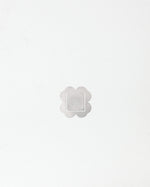 Image with a silver clover form square branded with 'arkisto' logo on a white background