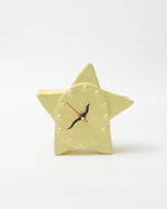 Star-shaped clock on a white background