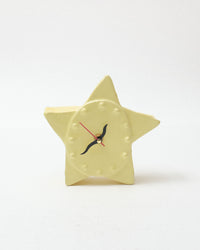 Star-shaped clock on a white background