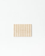 Rectangular beige dish on a white background