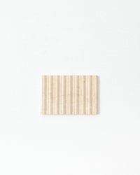 Rectangular beige dish on a white background