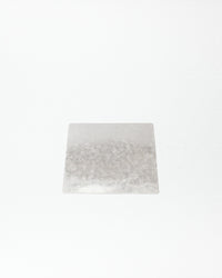 Rectangular white plate with patterns on a white background
