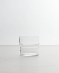 Clear glass tumbler on a white background