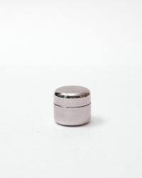 Silver metallic container on a white background
