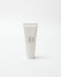 White tube of foam cleanser on a white background