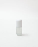 White cylindrical container on a white background