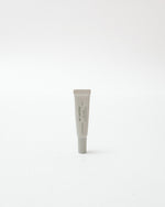 Lip care tube on a white background